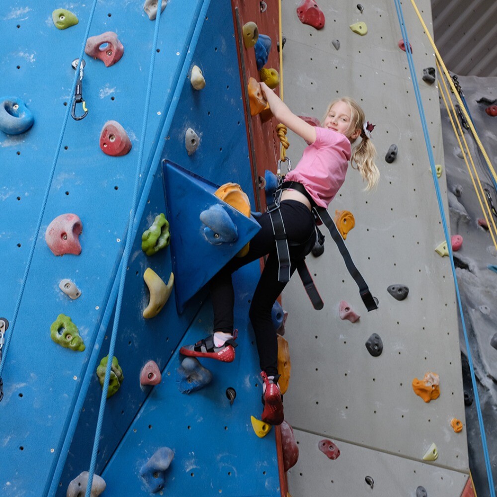 Girl climbing at Aztec Adventure Evesham